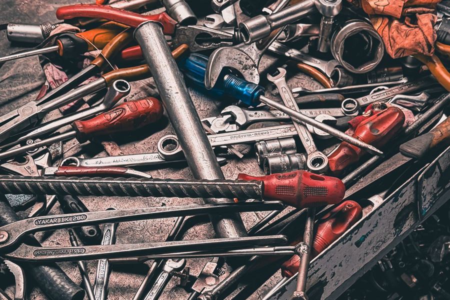 Workbench of hand tools used on garage door service calls